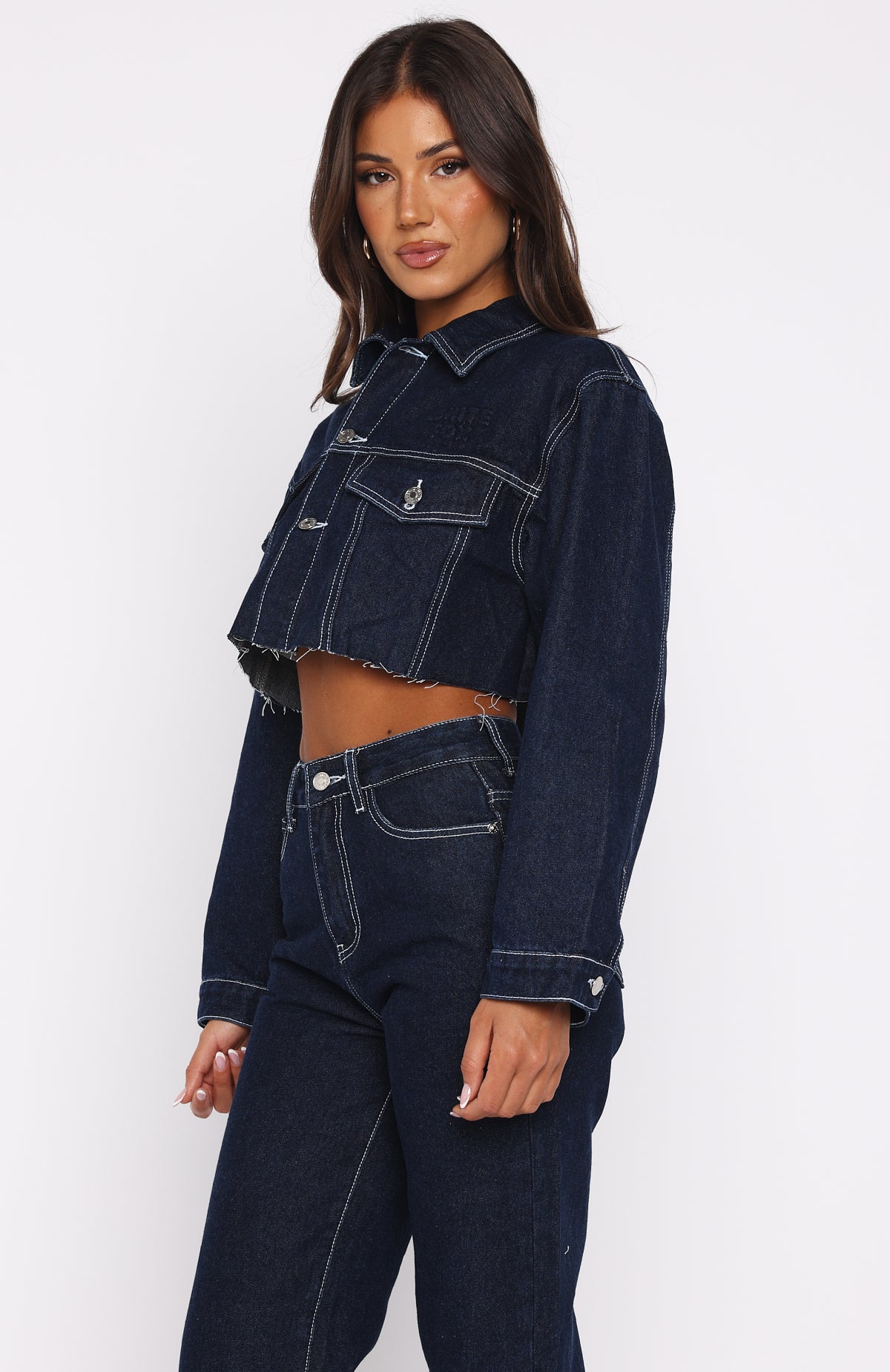 cropped jacket over fitted indigo knee length dress Something To Prove Cropped Denim Jacket Dark Indigo